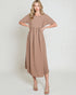 Woman wearing a brown dress against a white background