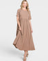 Woman wearing a brown dress on a white background