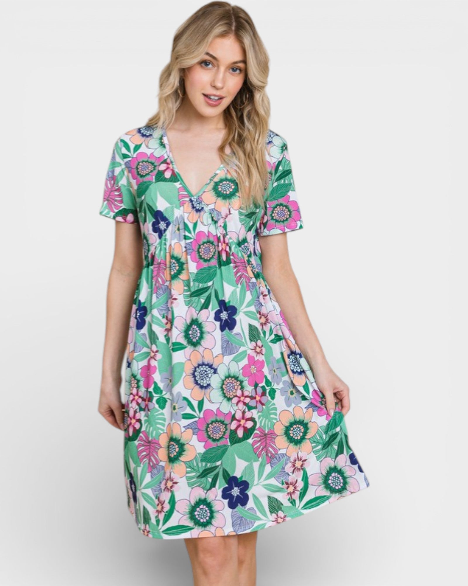 Woman wearing a floral dress on a white background
