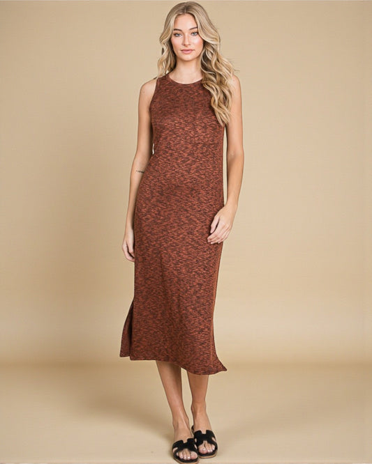 Woman wearing a brown sleeveless dress against a beige background