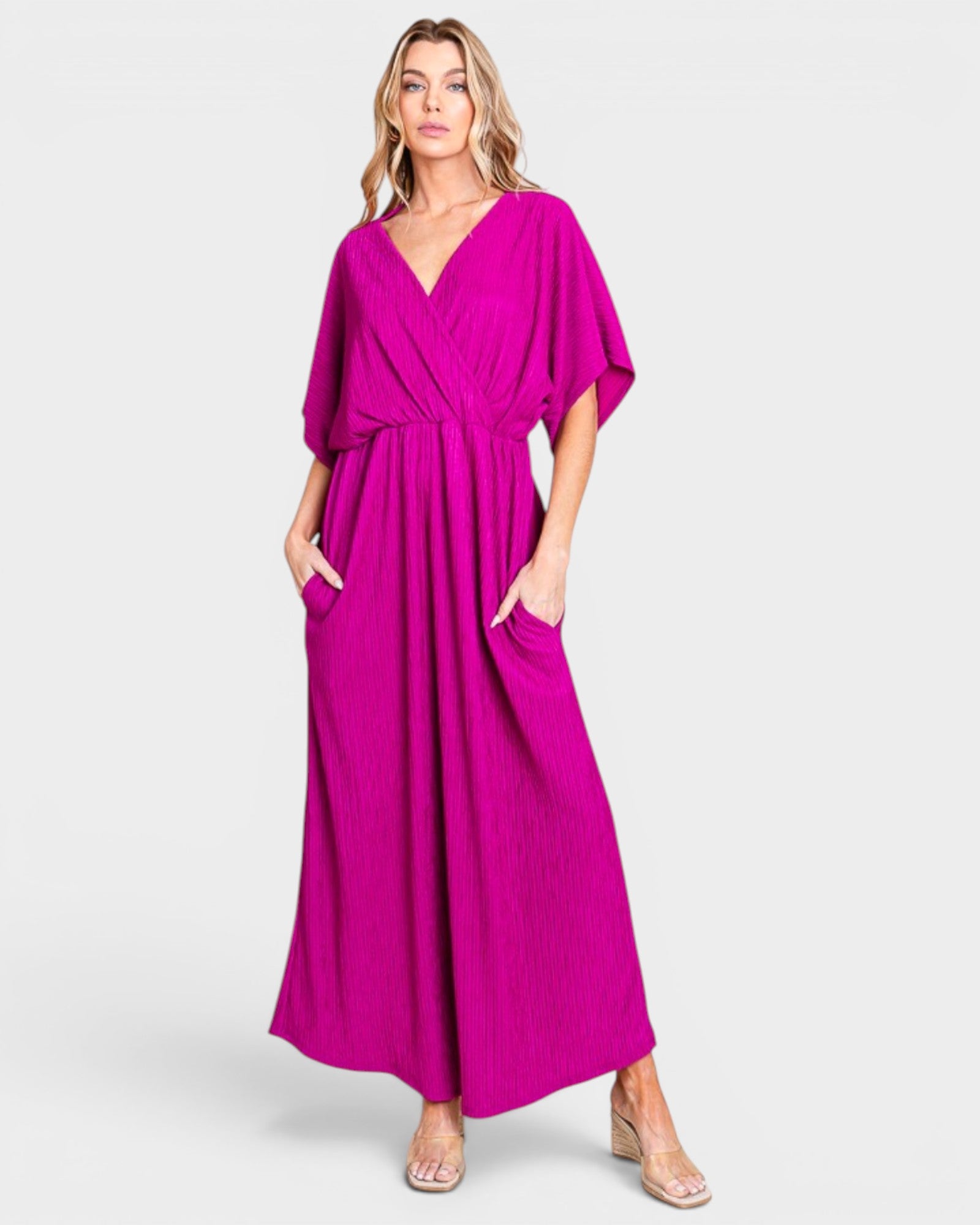 Vestido largo cruzado con bolsillos en color magenta