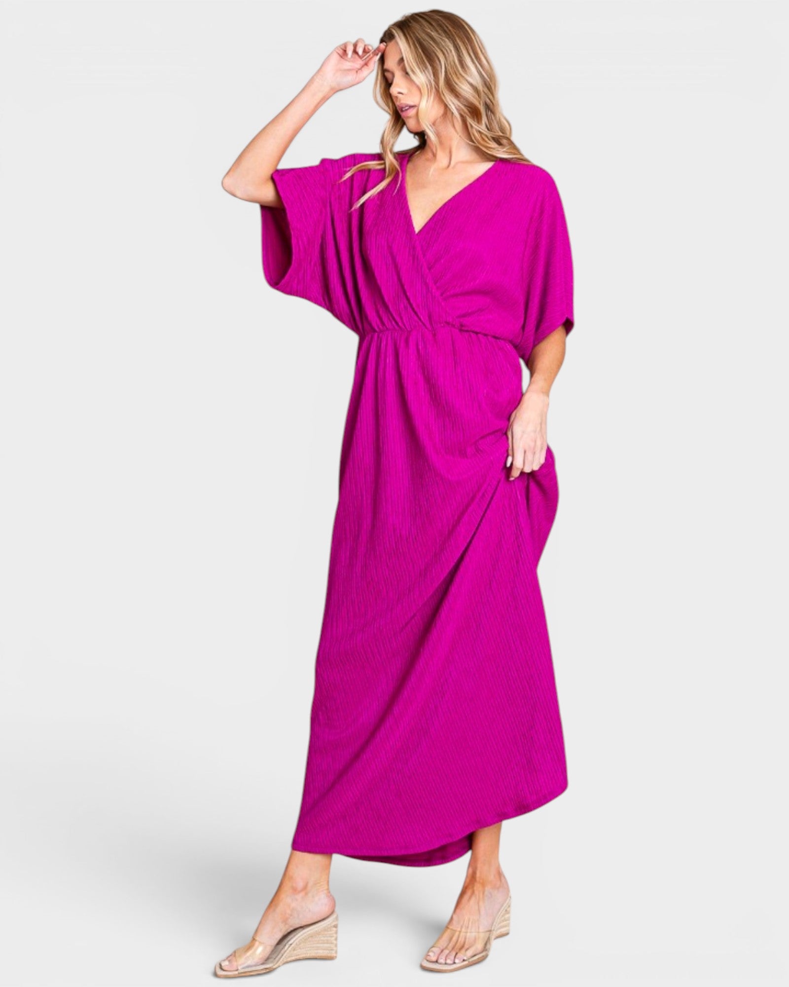 Vestido largo cruzado con bolsillos en color magenta