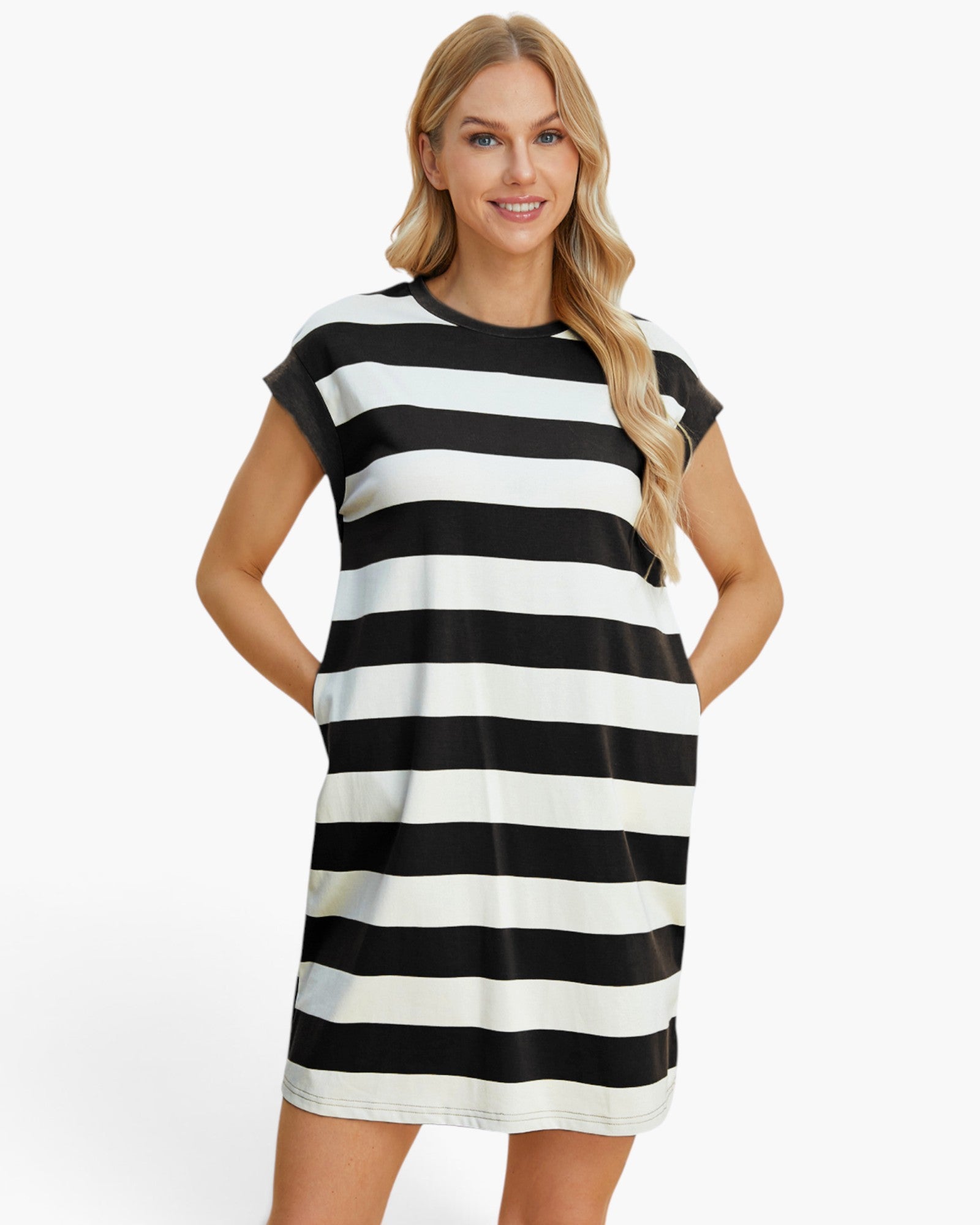 A woman modeling a short-sleeve black and white horizontally striped t-shirt dress against a plain white background.