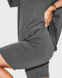 Gray dress with a belt on a white background