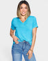 Woman wearing a blue t-shirt and jeans on a white background
