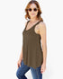 A woman modeling a sleeveless olive brown scoop-neck top with scalloped trim, paired with blue jeans and gold-framed sunglasses, against a plain white background.