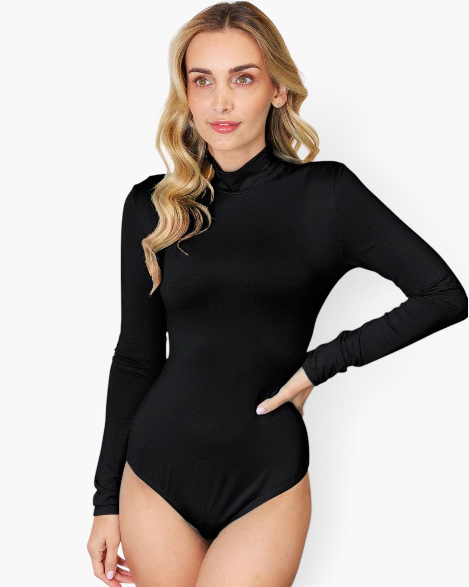 A woman modeling a black long-sleeve mock neck bodysuit against a plain white background.