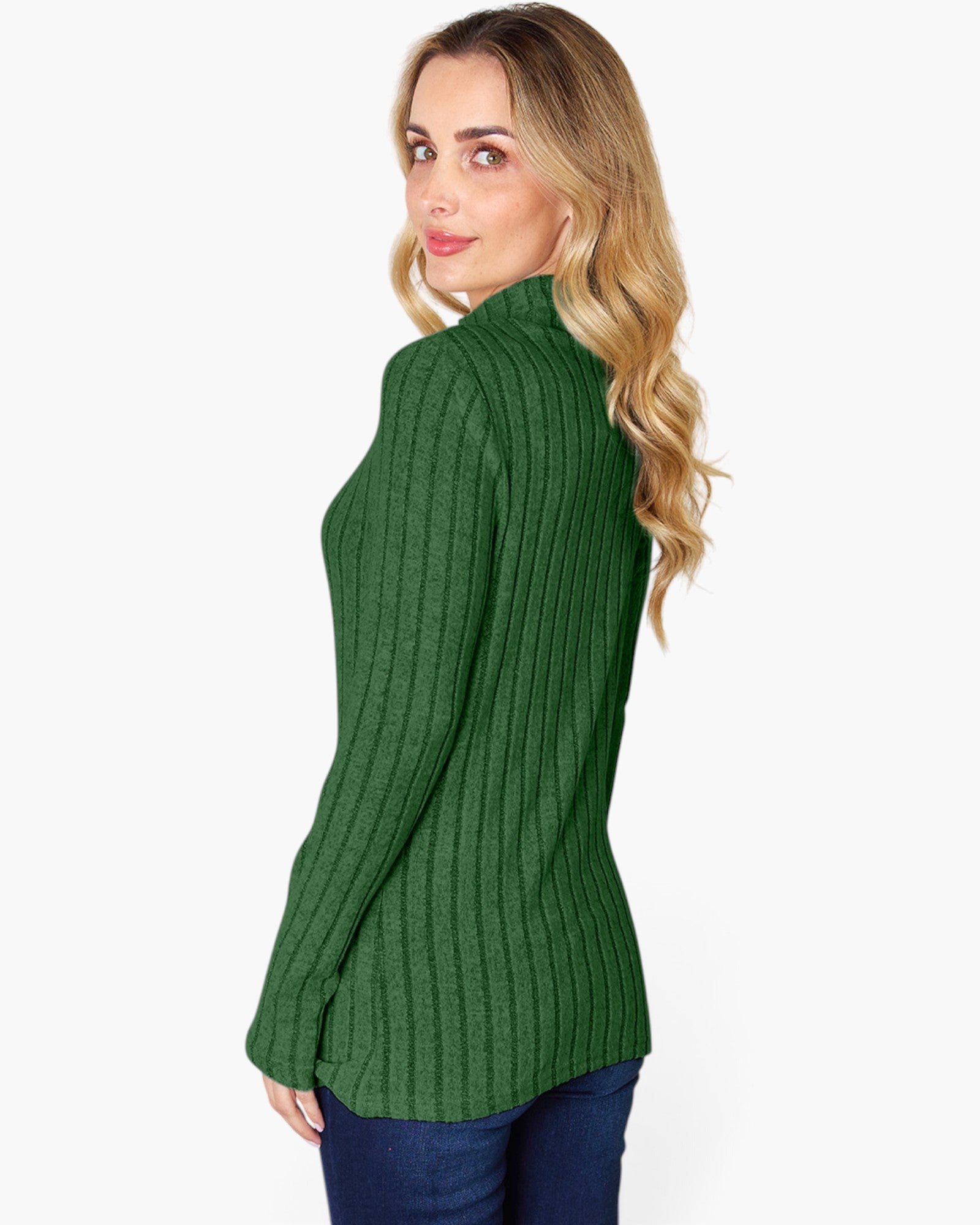 A woman wearing a green ribbed knit mock neck sweater, shown from a side-back angle against a plain white background.