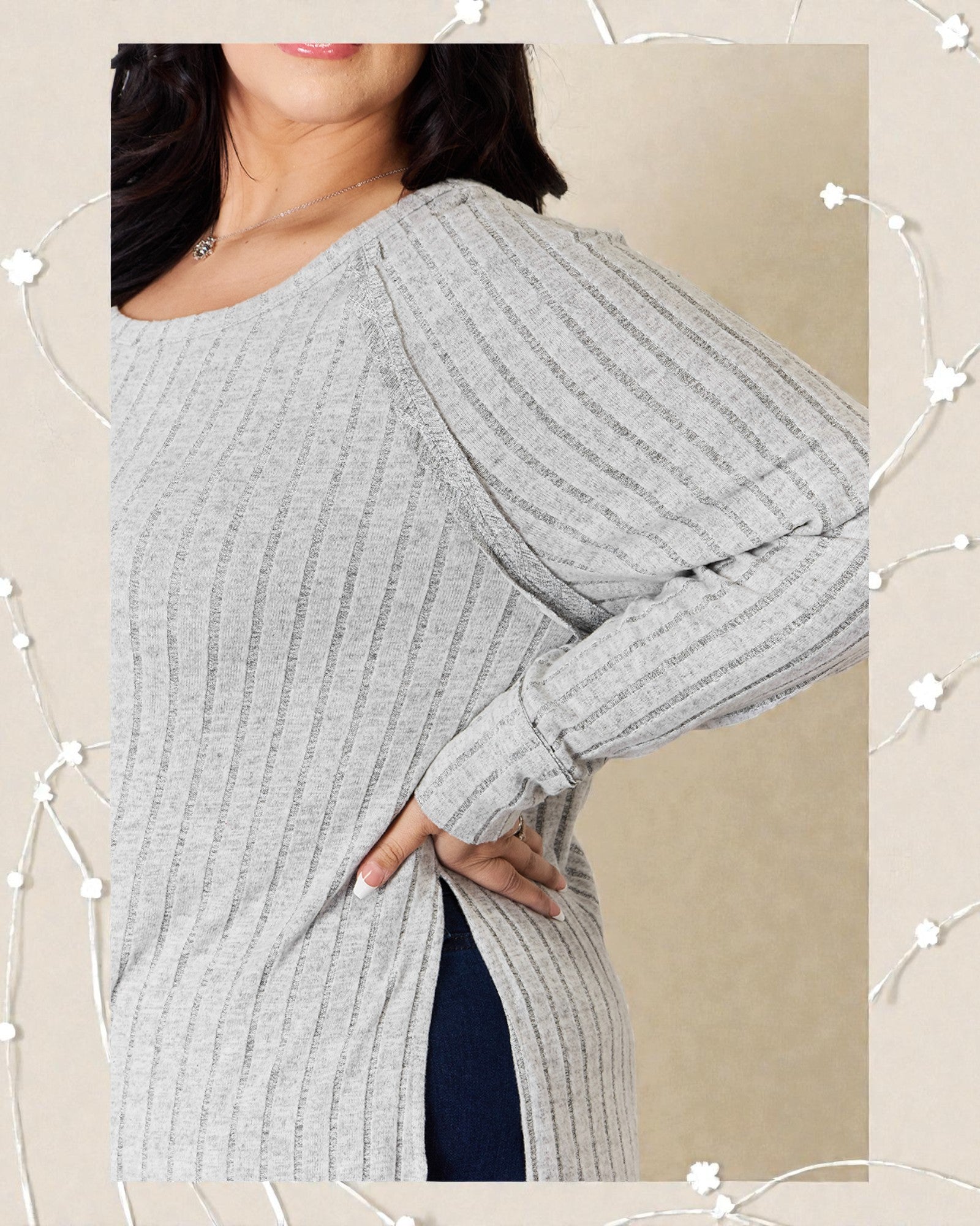 Gray ribbed sweater worn by a person on a beige background