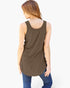 A woman shown from the back wearing a sleeveless, scoop-neck tunic top in a solid dark brown color, paired with blue jeans, against a plain white background.