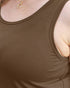 Close-up of a person wearing a scoop-neck tank top in a solid dark brown color, with a gold necklace visible at the collar.
