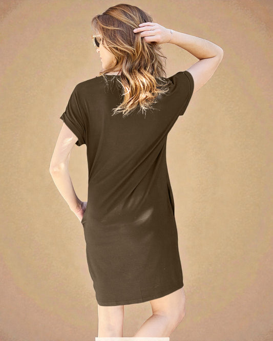 Woman wearing a brown dress against a beige background