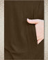 Brown fabric with a hand pushing against it