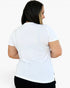 A woman shown from the back wearing a plain white short-sleeve crewneck t-shirt and black pants, photographed against a clean white studio background.