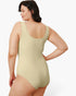 A woman modeling a sleeveless scoop-neck one-piece swimsuit from the back, shown against a plain light gray studio background.