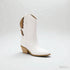 White cowboy boot with brown accents on a light gray background