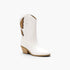 A white faux-leather western cowboy boot with brown leather decorative stitching and a light brown stacked block heel, shown from a three-quarters angle on a white background.