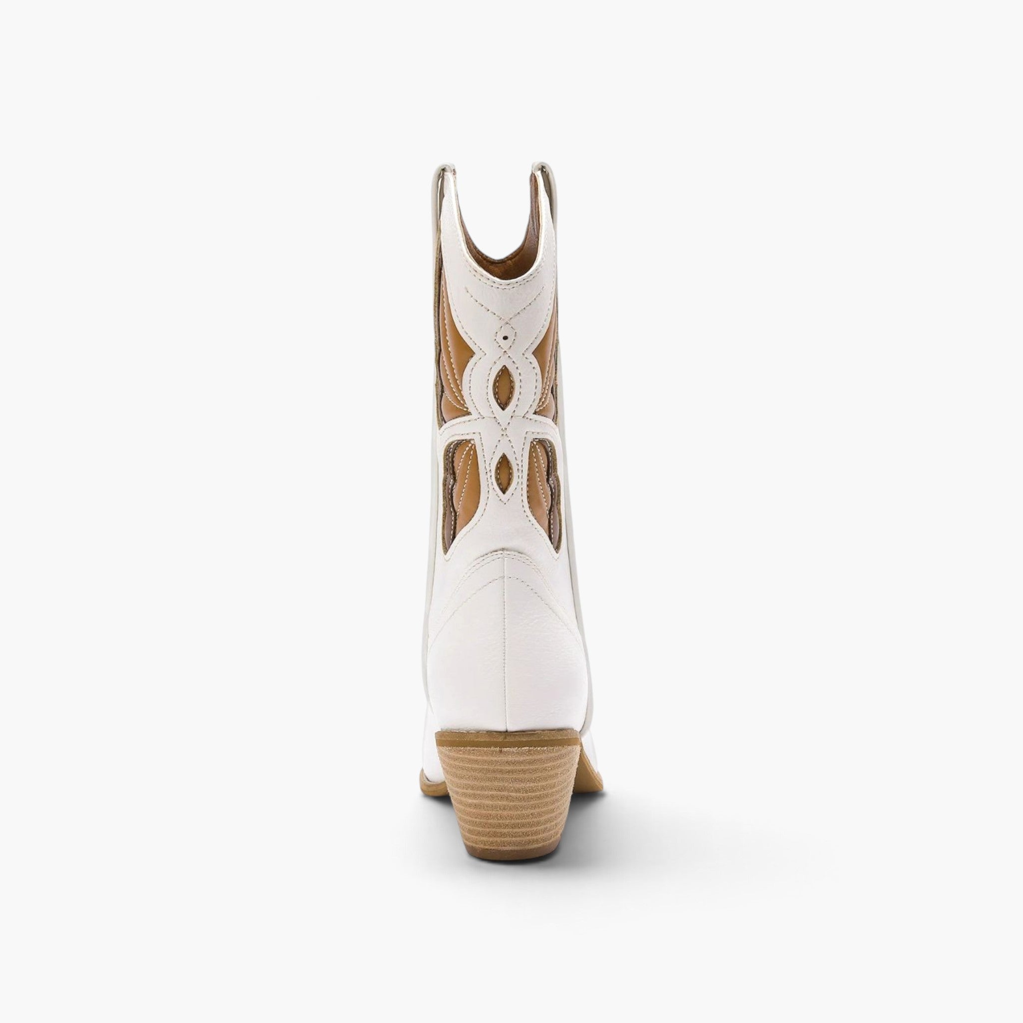 A white leather cowboy boot with intricate cutout detailing on the shaft and a stacked tan wood-look heel, shown from a rear three-quarter view against a clean white background.