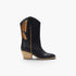 A black leather cowboy boot with a brown and gold butterfly applique on the side, a light wood block heel, and a pull tab, shown against a plain white background.