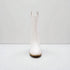 White knee-high boot on a white background