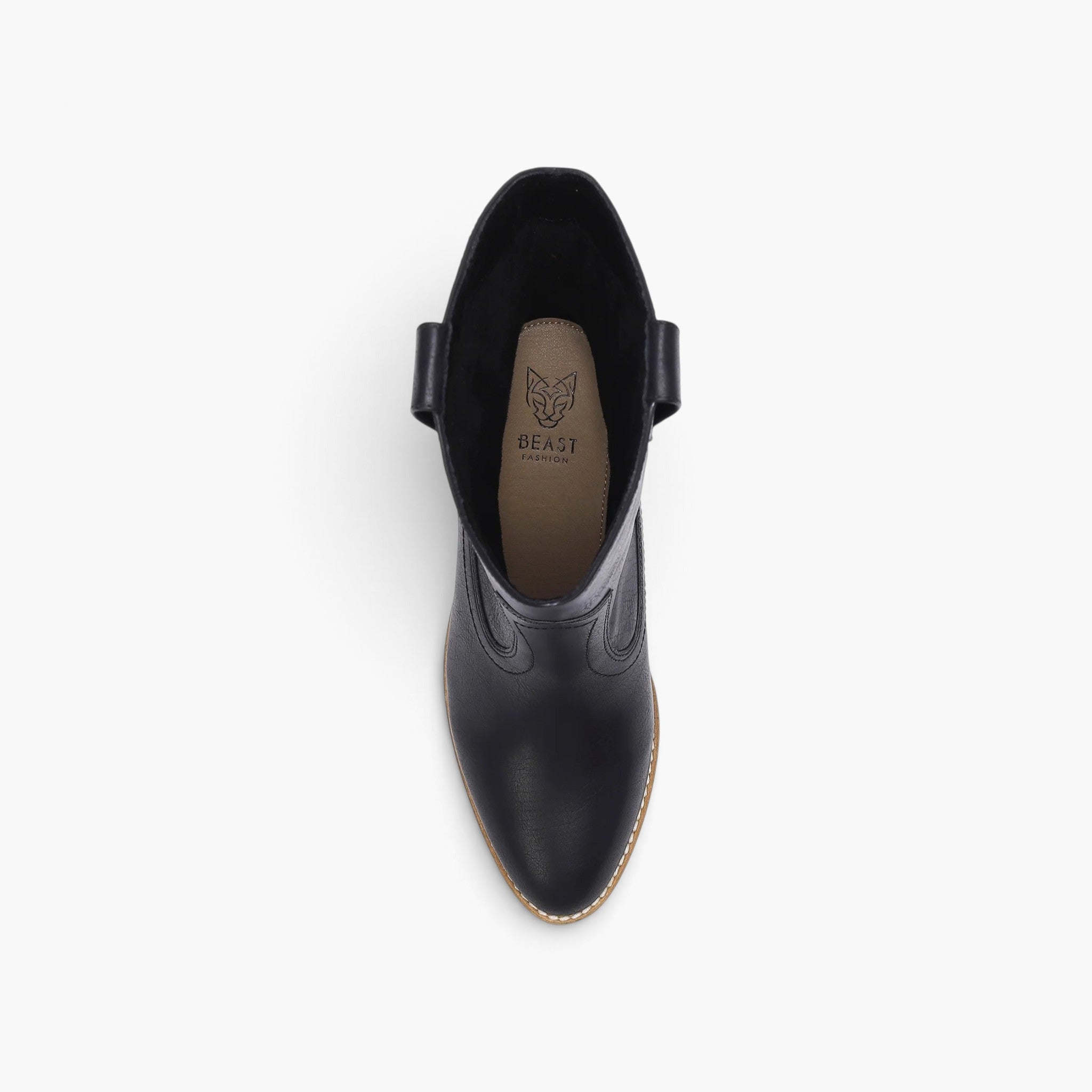 A top-down view of a black leather ankle boot with a side buckle strap, shown on a clean white background. The insole features a tan logo with the brand name 'BEAST'.