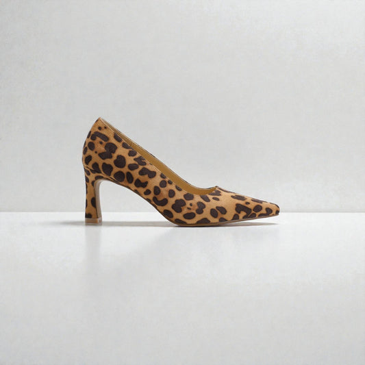 Leopard print high heel shoe on a white background