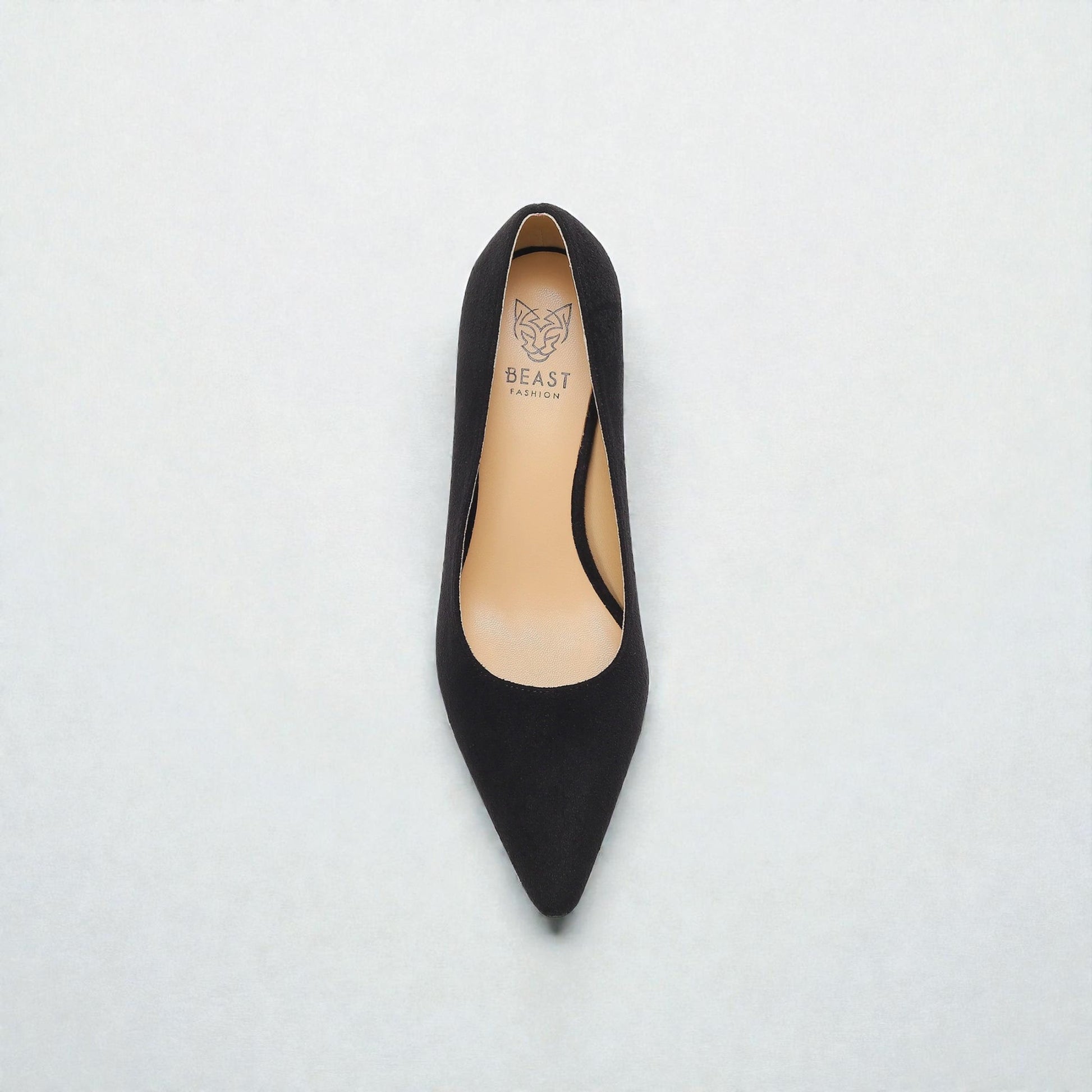 Black high-heeled shoe on a light gray background