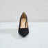 Black high-heeled shoe on a white background