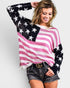 Woman wearing an American flag sweater on a plain background