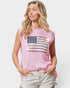 Woman wearing a pink sleeveless top with an American flag design on a white background