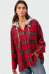 Person wearing a red plaid shirt with a gray hood on a white background