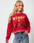 Woman wearing a red sweater with 'Merry & Bright' text on a plain background