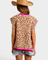 Person wearing a leopard print top with pink trim and denim shorts on a white background