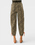 Leopard print pants worn by a person on a white background
