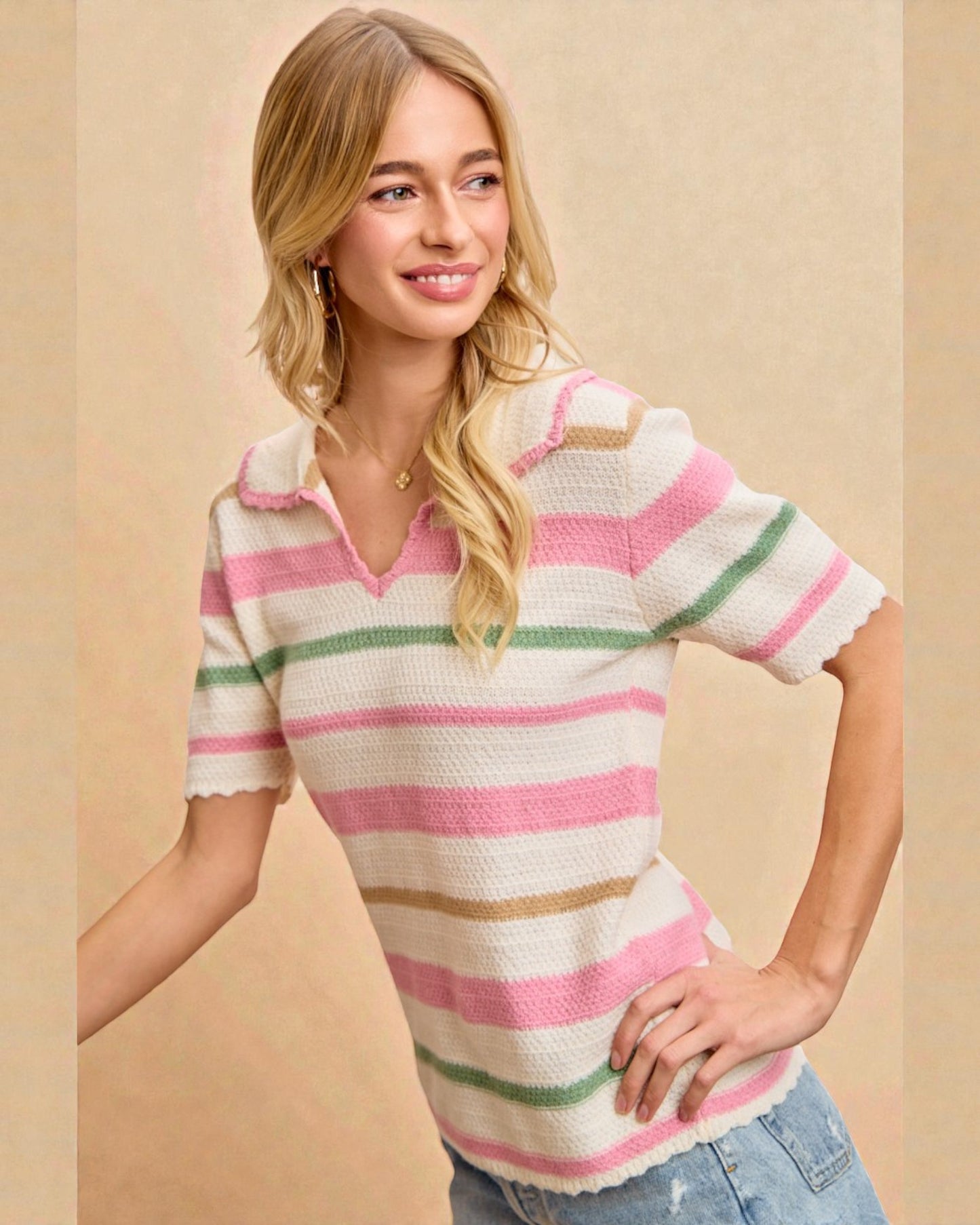 Woman wearing a colorful striped shirt against a beige background