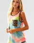 Woman wearing a colorful tie-dye tank top with a leopard print pocket on a plain background