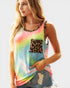 Woman wearing a colorful tie-dye tank top with leopard print accents on a white background