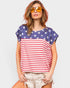 Woman wearing a t-shirt with American flag design on a plain background