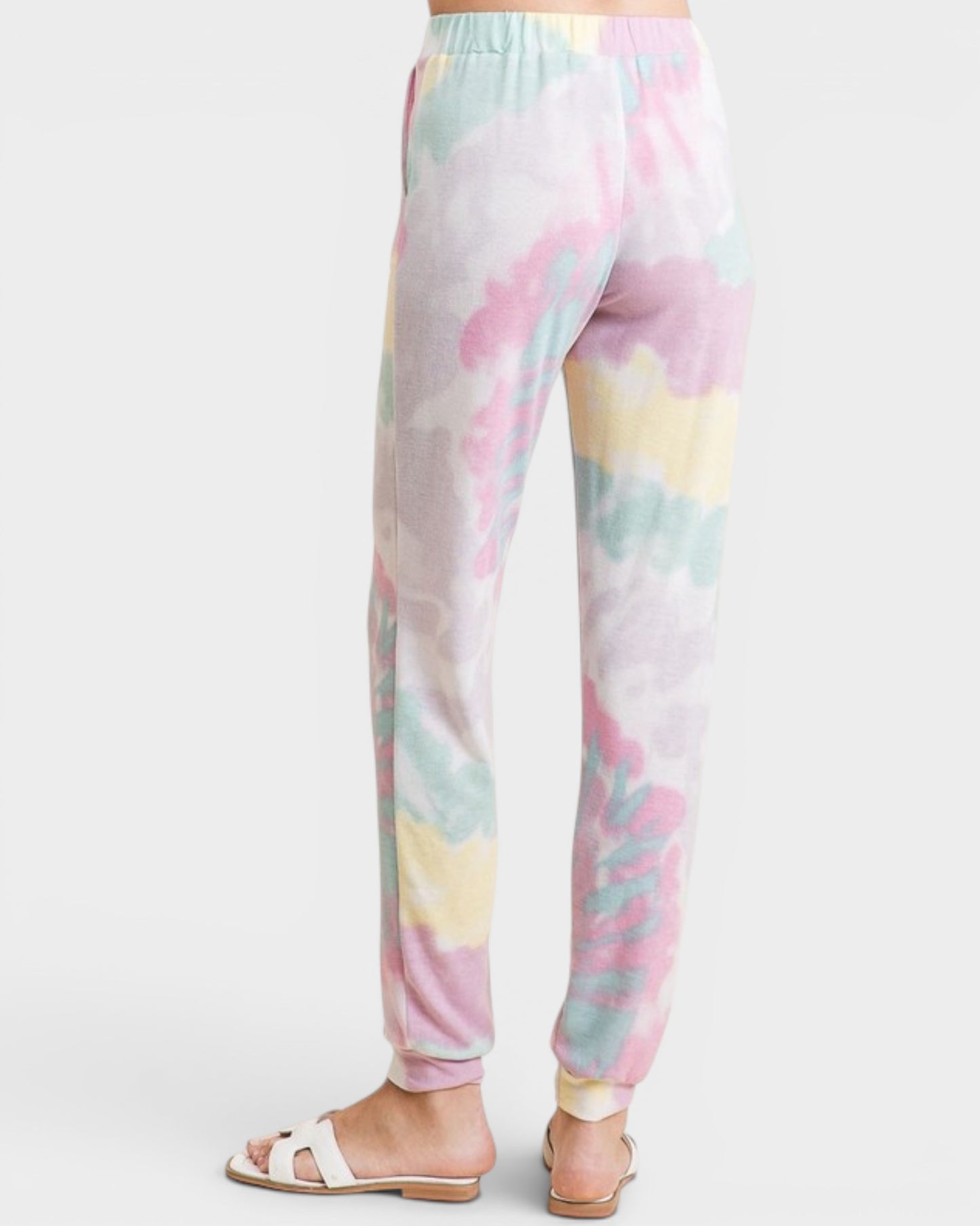 Pastel tie-dye pants on a white background