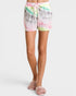 Person wearing tie-dye shorts on a white background