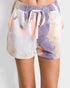 Tie-dye shorts with a drawstring on a plain background