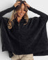 Woman wearing a black fleece pullover against a white background
