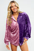 Woman wearing a two-tone purple and pink velvet shirt on a white background