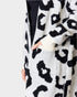 Leopard print cardigan worn by a person on a white background