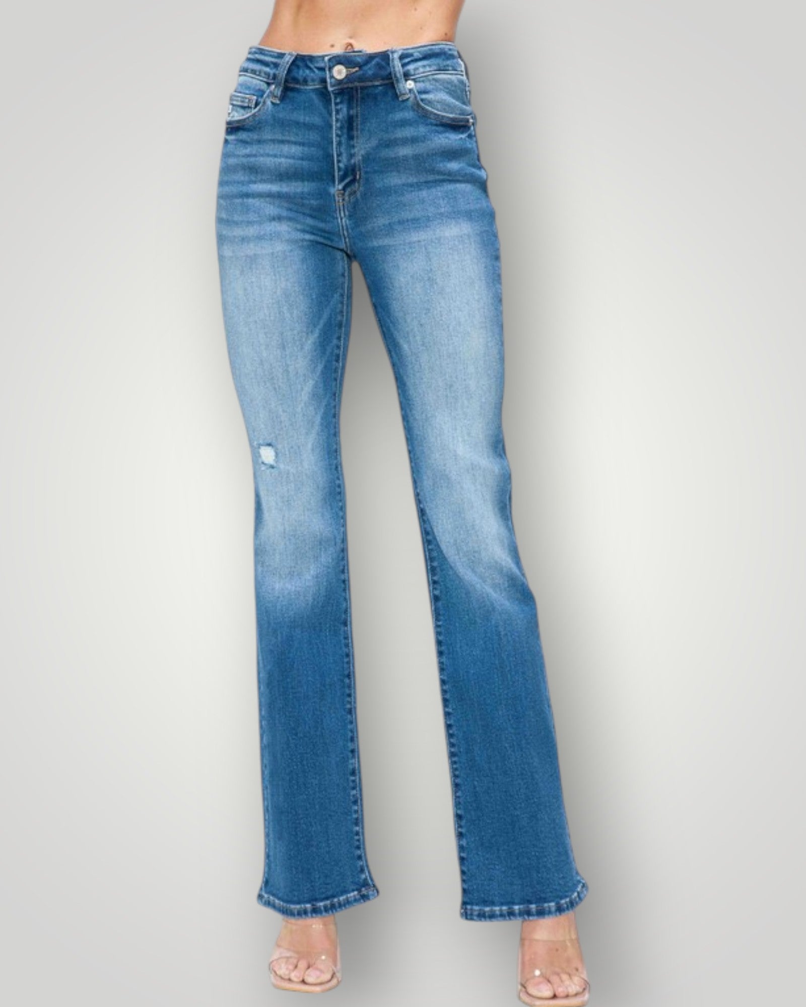 Blue jeans on a plain background