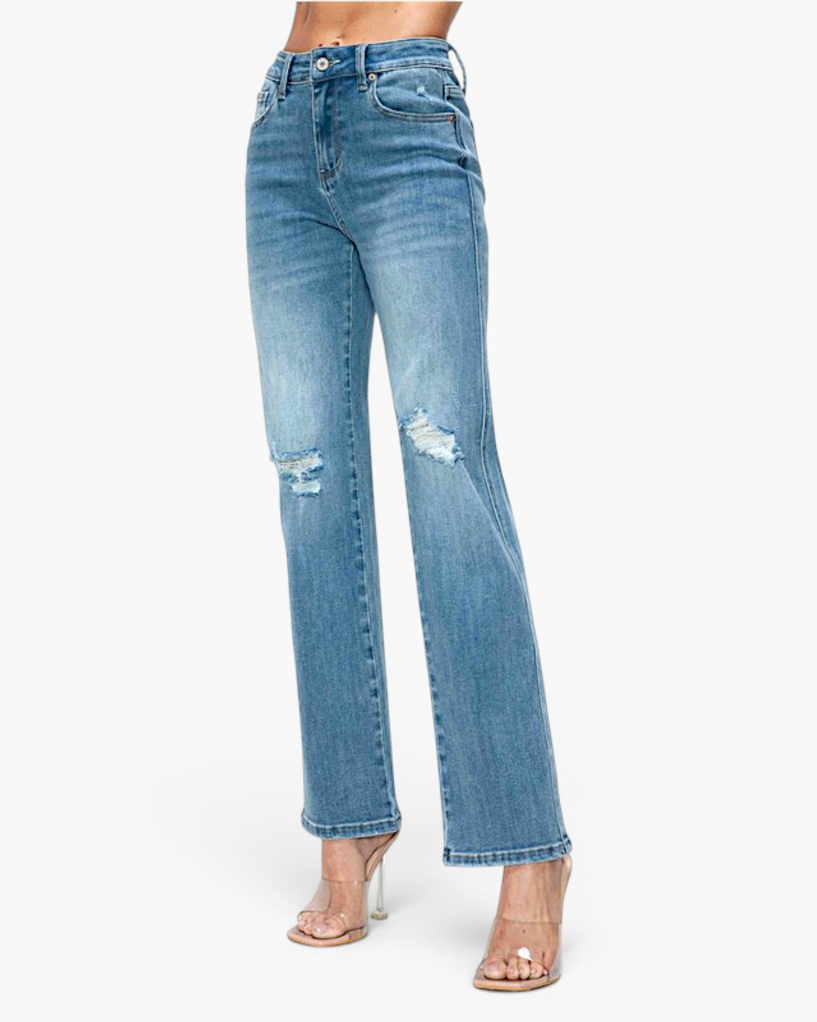 Light blue high-waisted straight-leg jeans with distressed rips on the thighs, shown on a model wearing clear high-heeled sandals against a white studio background.