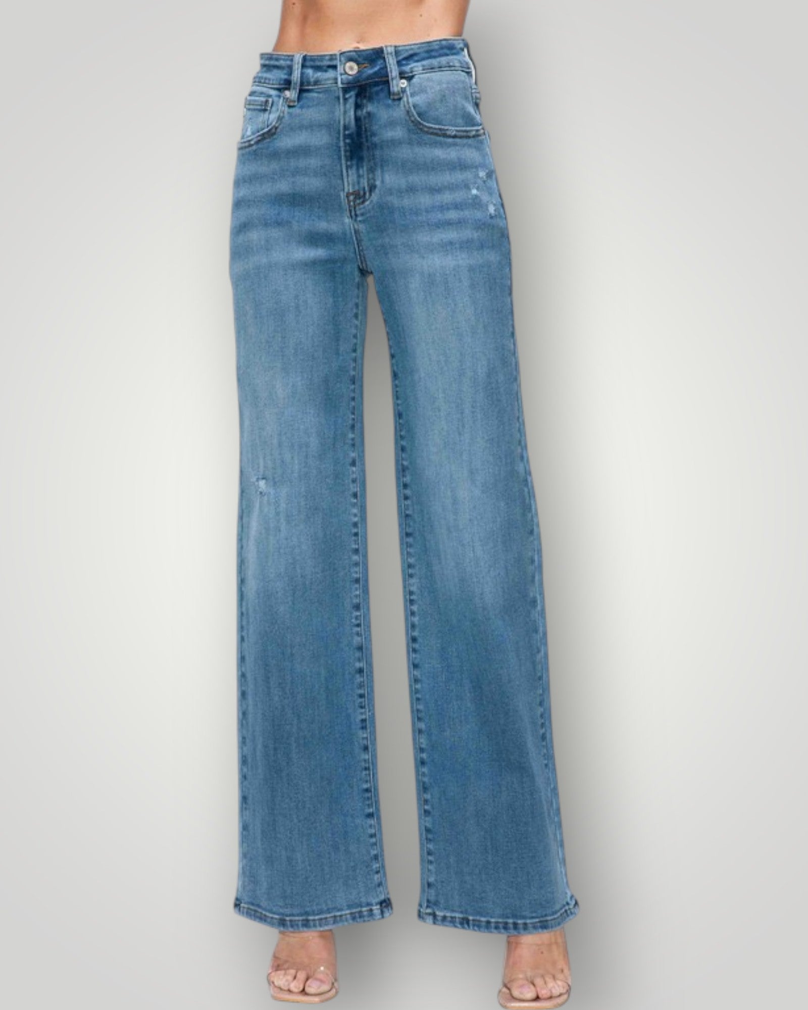 Blue jeans on a plain background