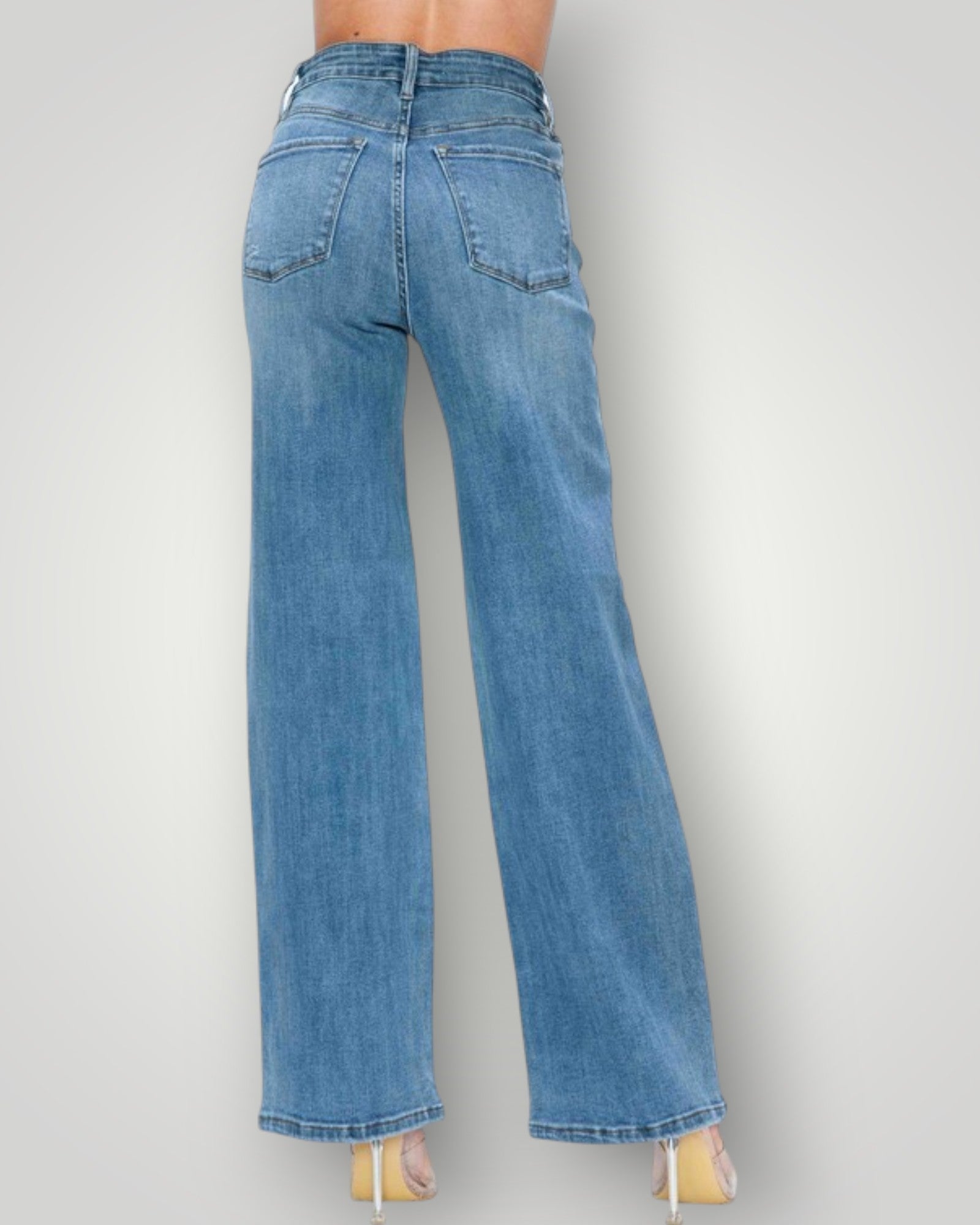Blue jeans on a plain background
