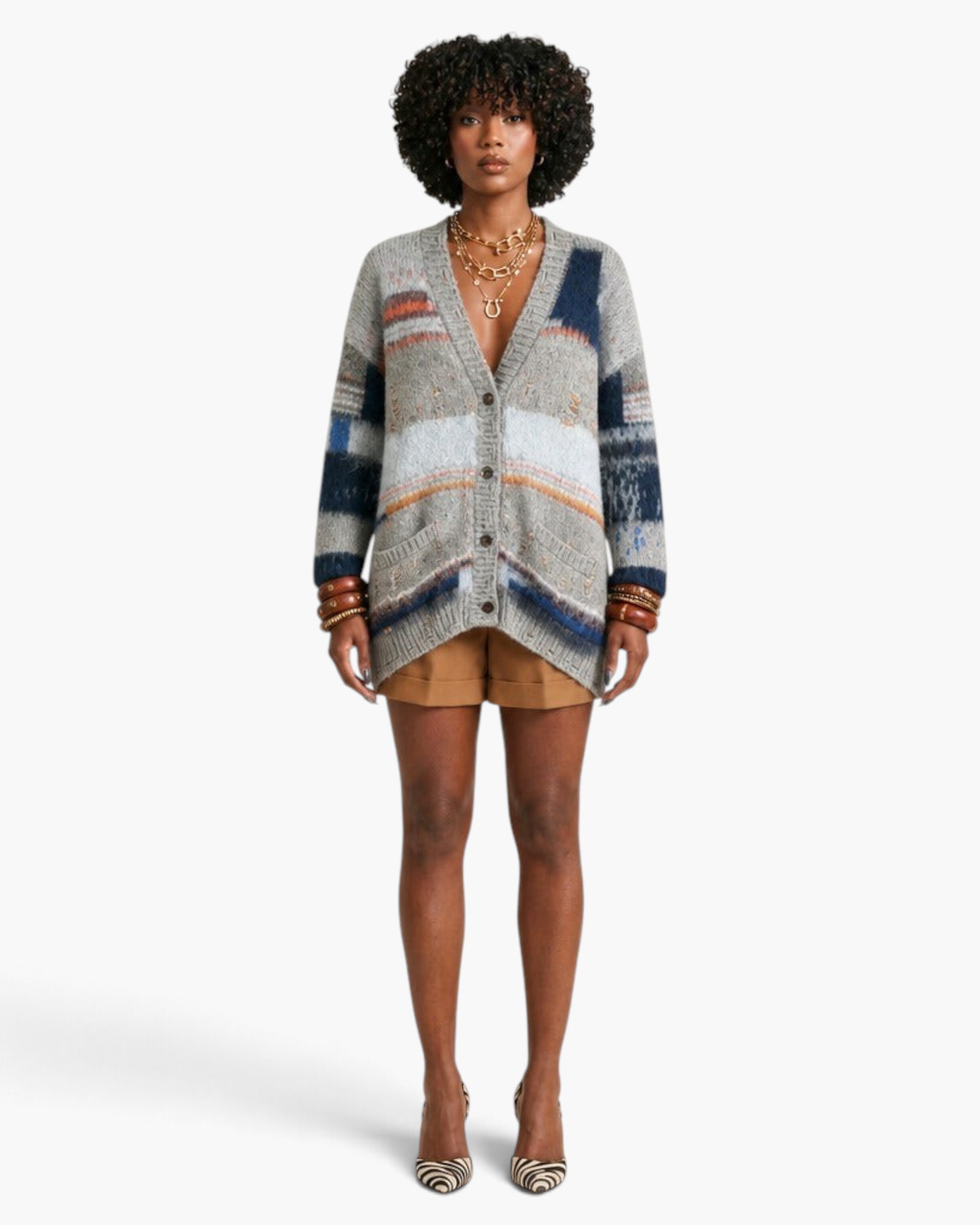 Beach Rose Co. relaxed patchwork knit cardigan with patterned stripes, V-neck, and patch pockets on a model