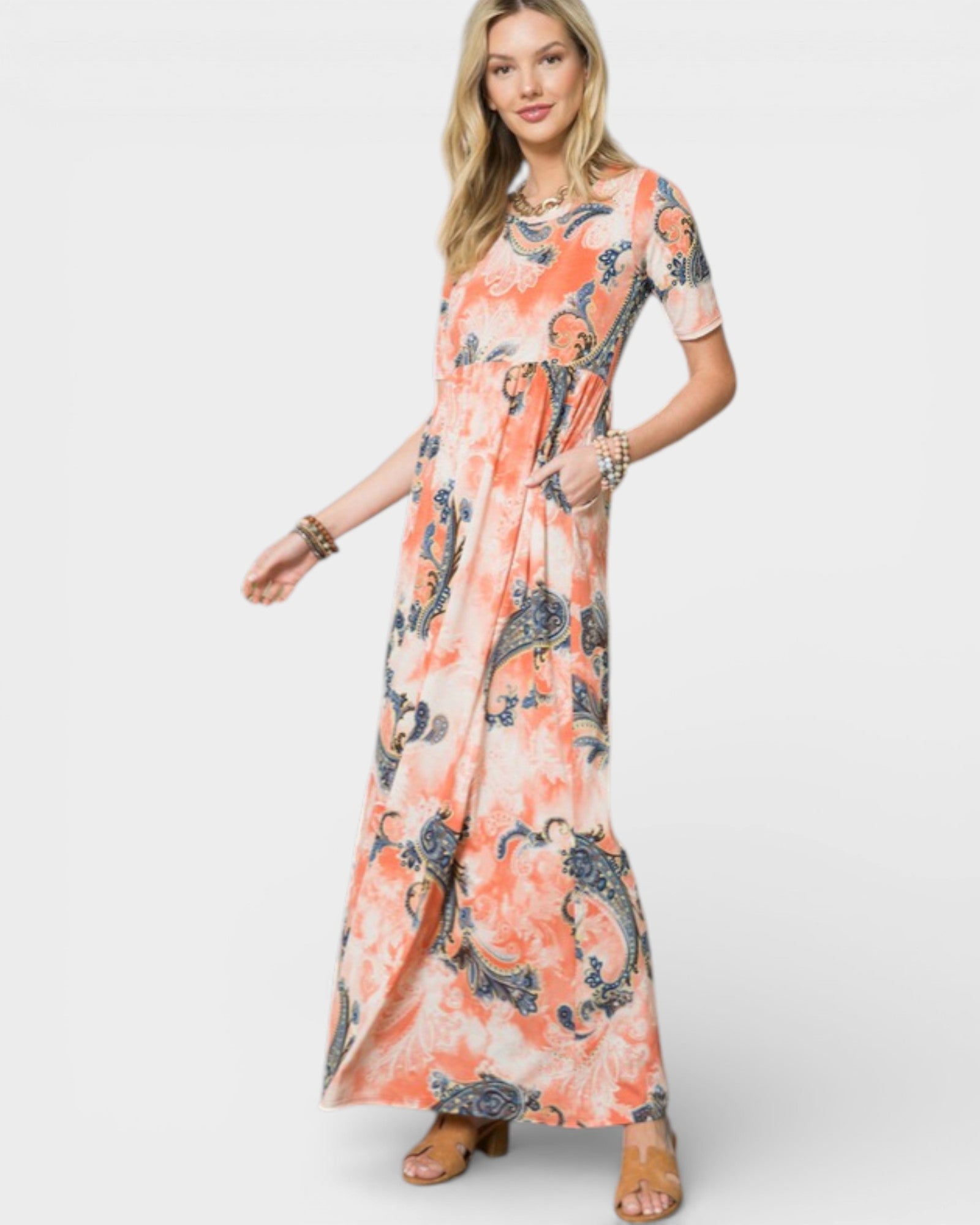 Woman wearing a floral dress on a white background